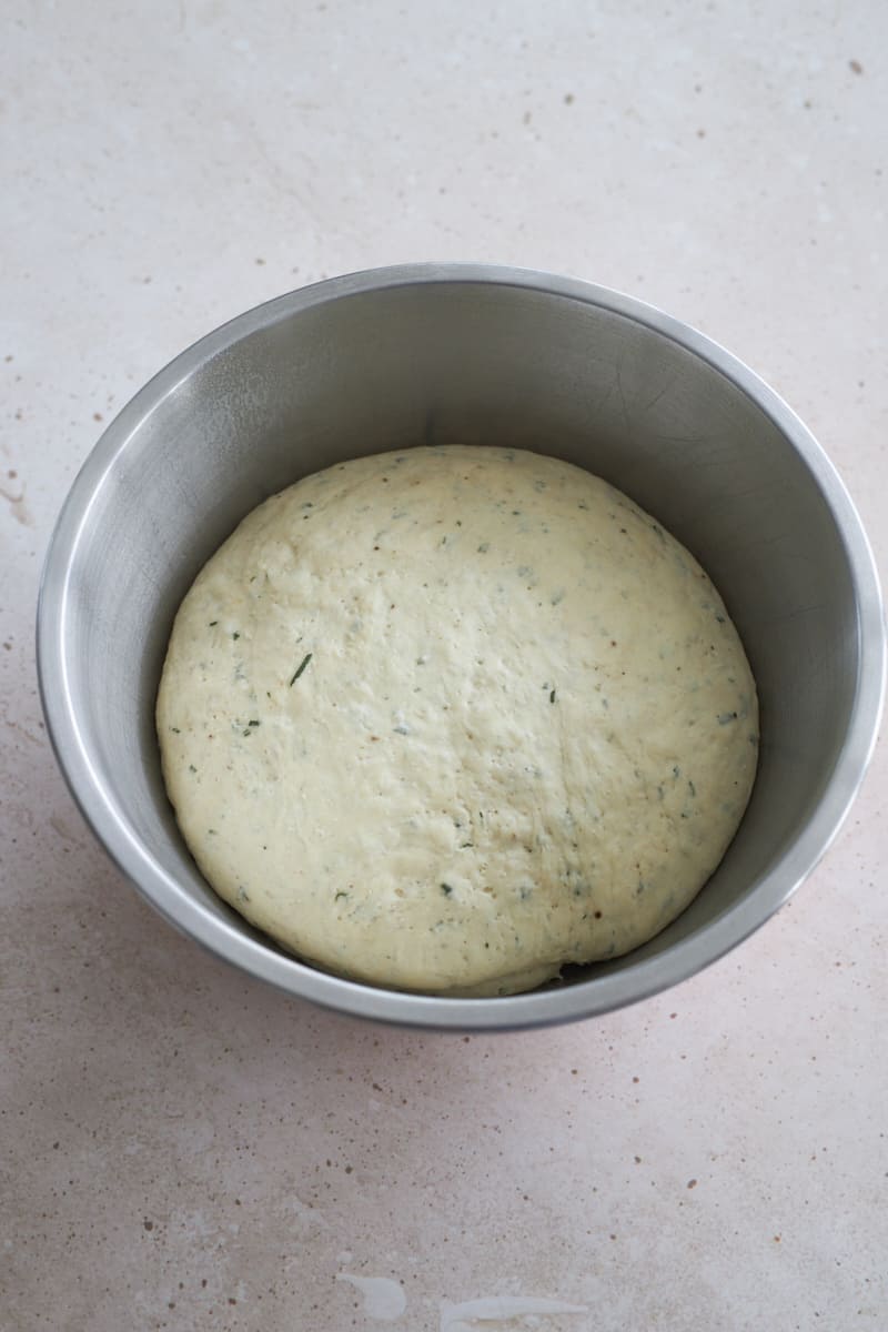 Dough in a large bowl after rising.