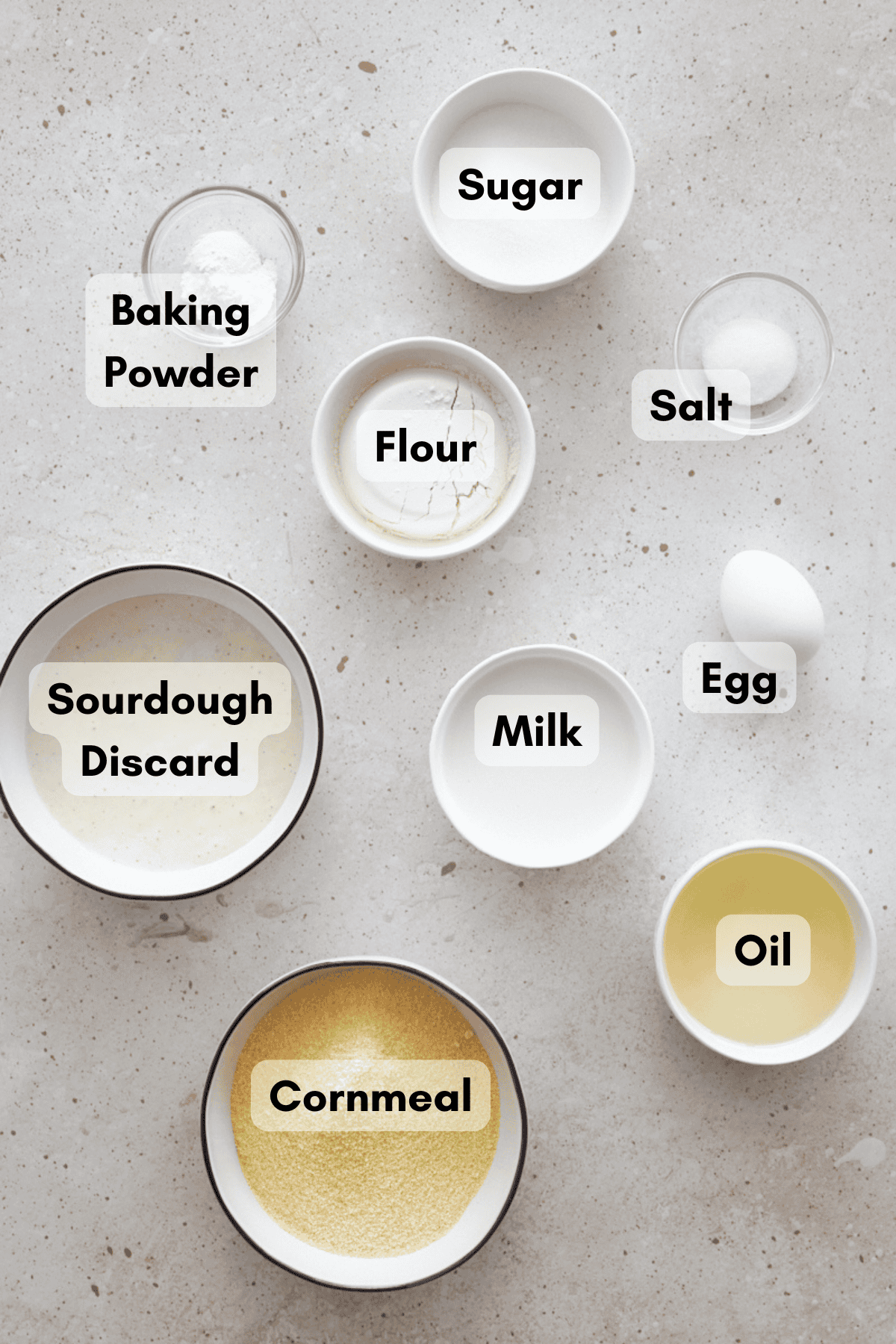 Ingredients for Sourdough Discard Cornbread in small bowls. 