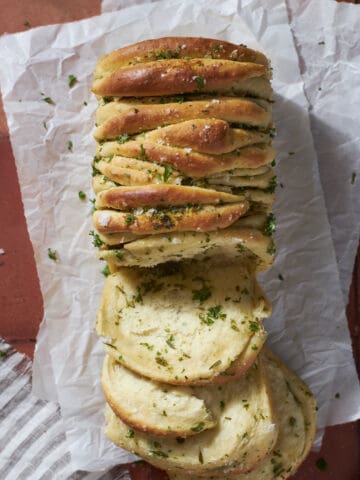 Sourdough Discard Pull Apart Bread with a few layers pulled out.