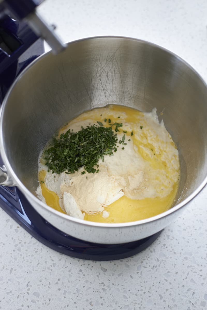 Ingredients in the bowl of a stand mixer.