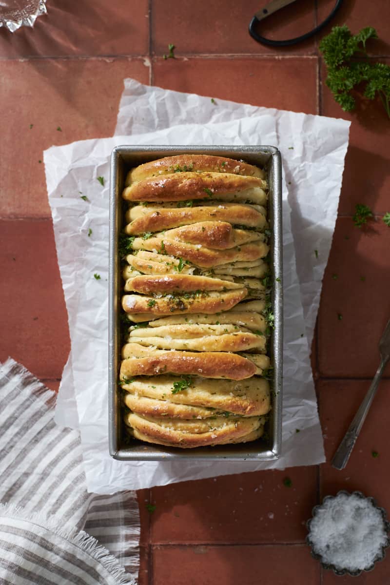 Sourdough Discard Garlic Pull Apart Bread in the bread pan.