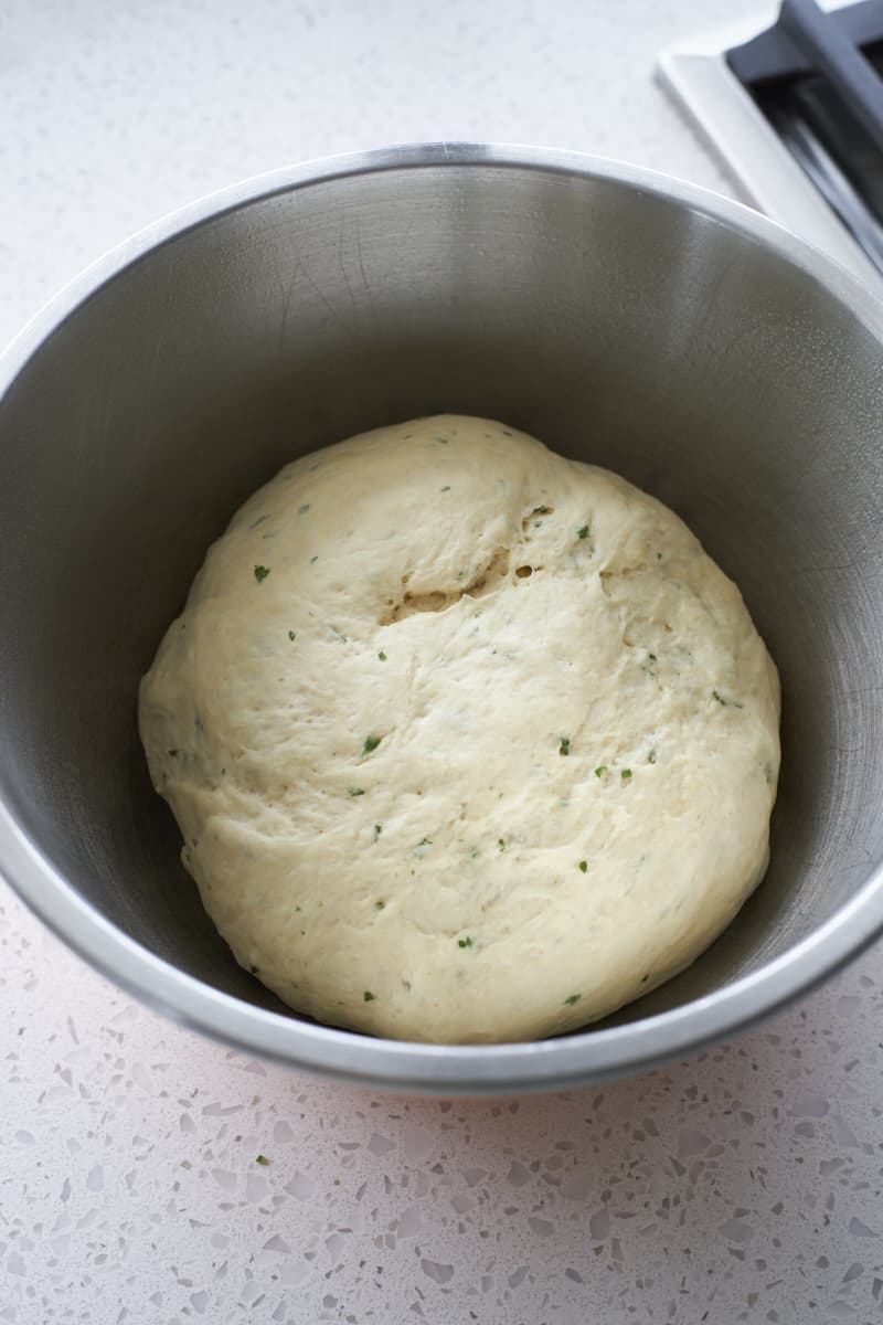 Dough in a bowl after the first rise.