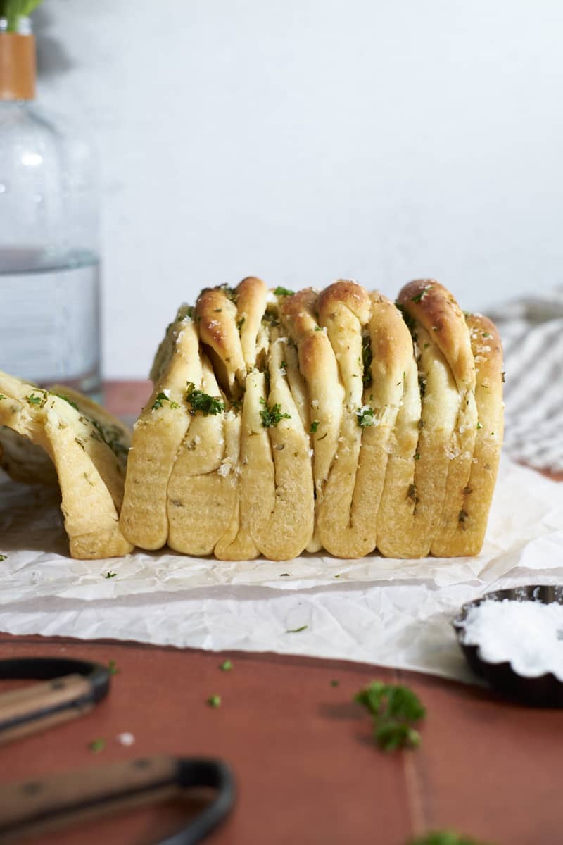 Side view of Sourdough Discard Garlic Pull Apart Bread.