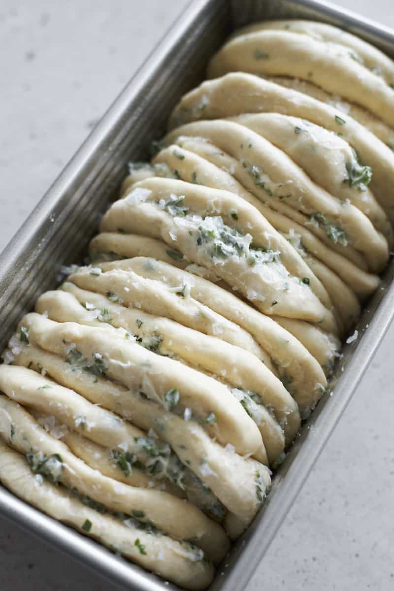 Side view of the Sourdough Discard Garlic Pull Apart Bread ready to bake.