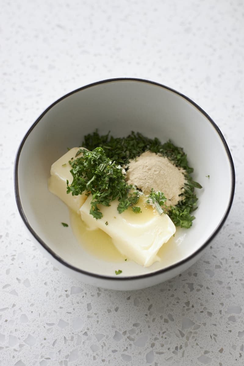 Ingredients for the butter mixture in a small bowl.