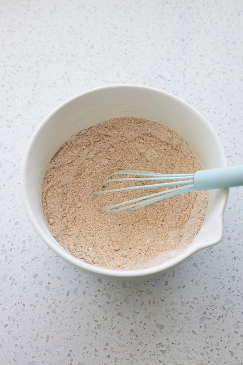 Dry ingredients mixed together in a mixing bowl.