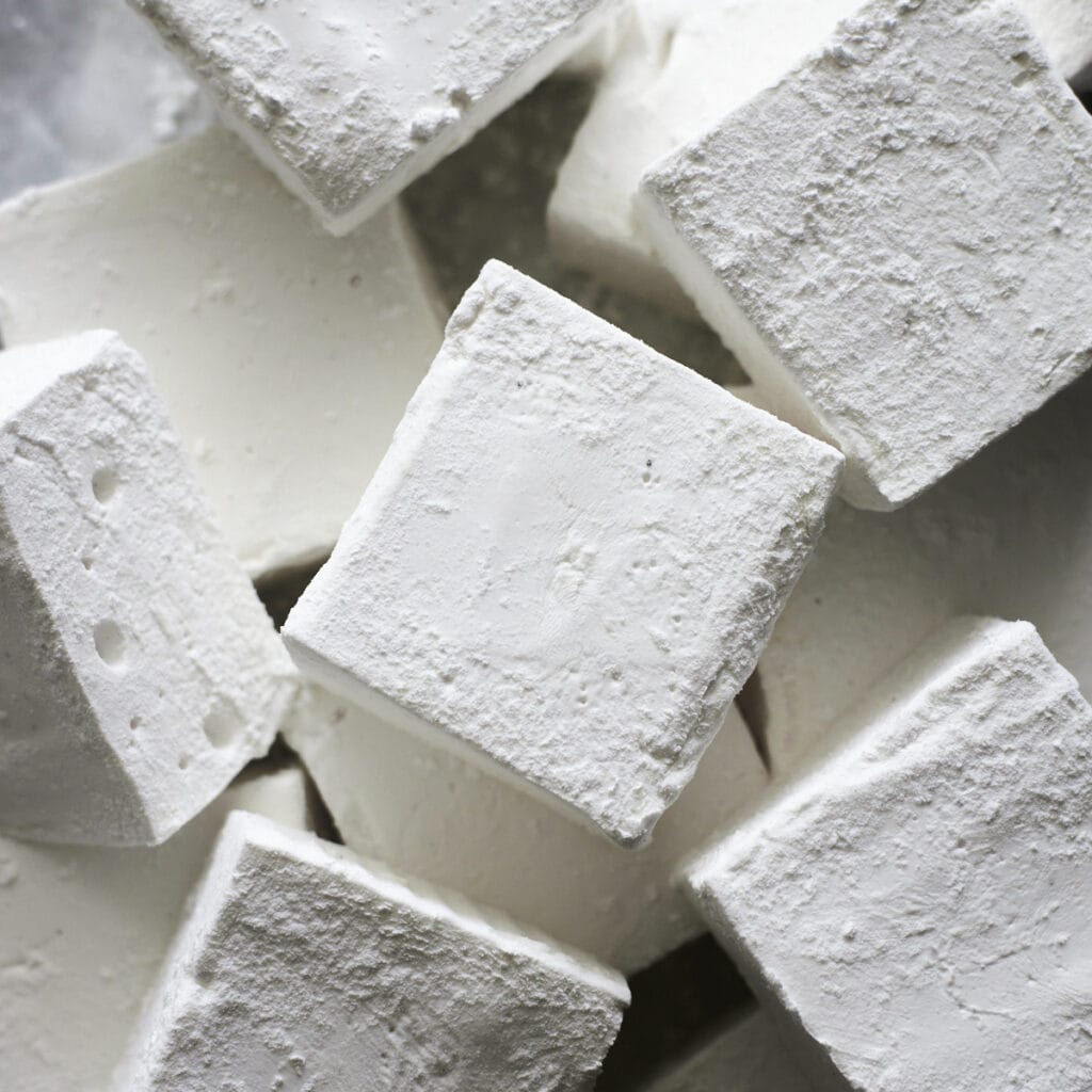 Closeup of Classic Vanilla Marshmallows in a pile.