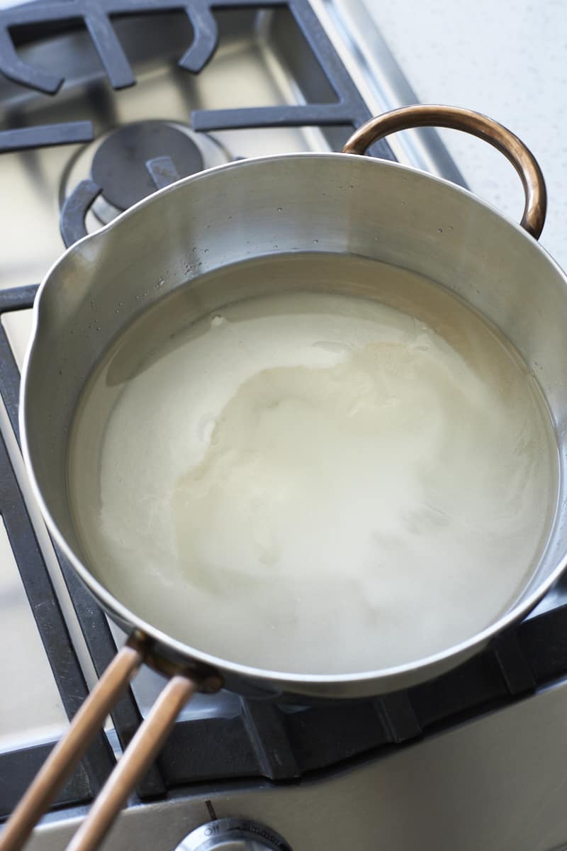 Sugar, corn syrup and water in a saucepan.