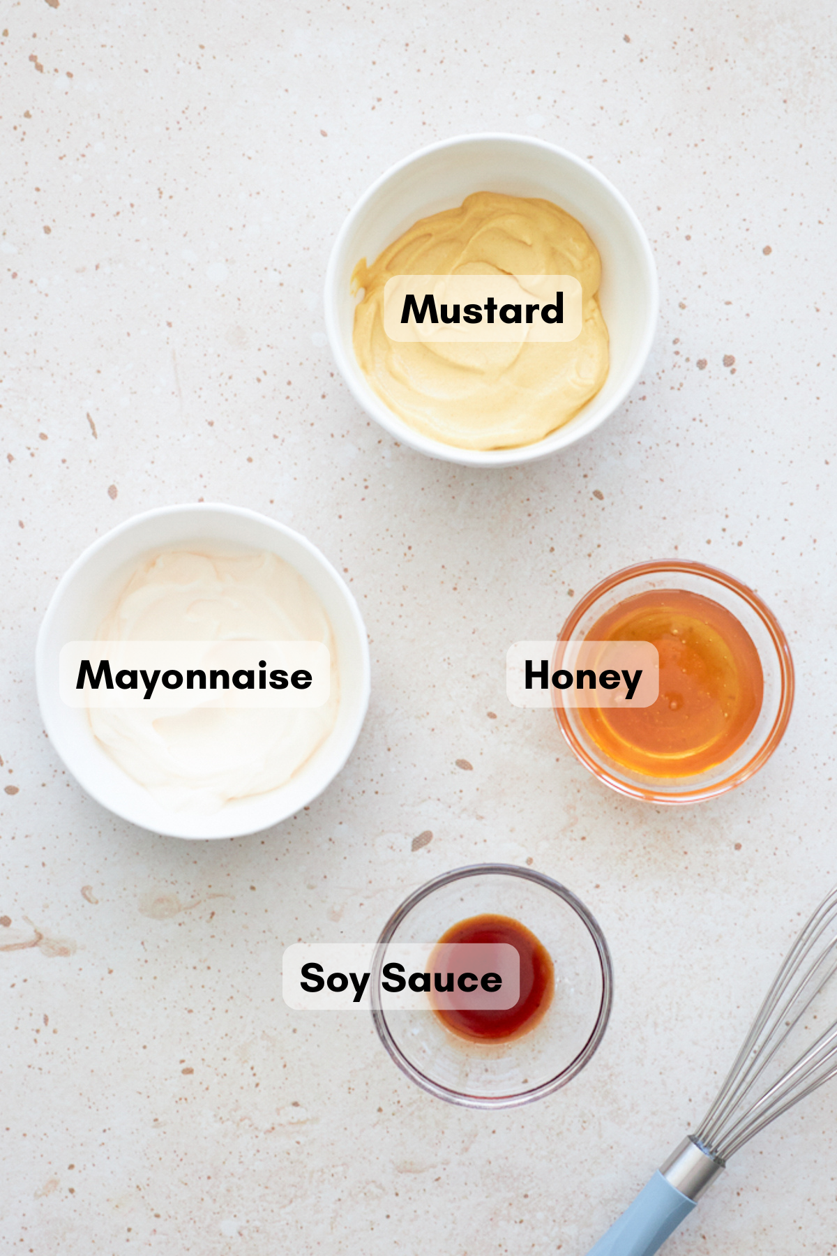 Ingredients for Honey Mustard Dipping Sauce in small bowls.