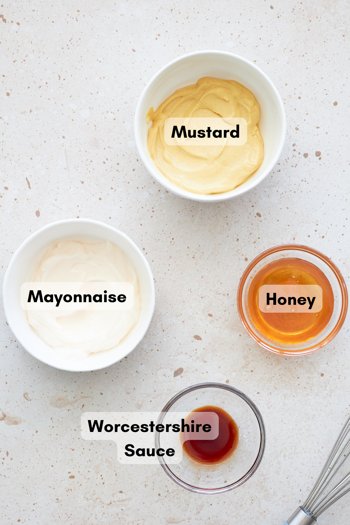 Ingredients for Honey Mustard Dipping Sauce in small bowls. 