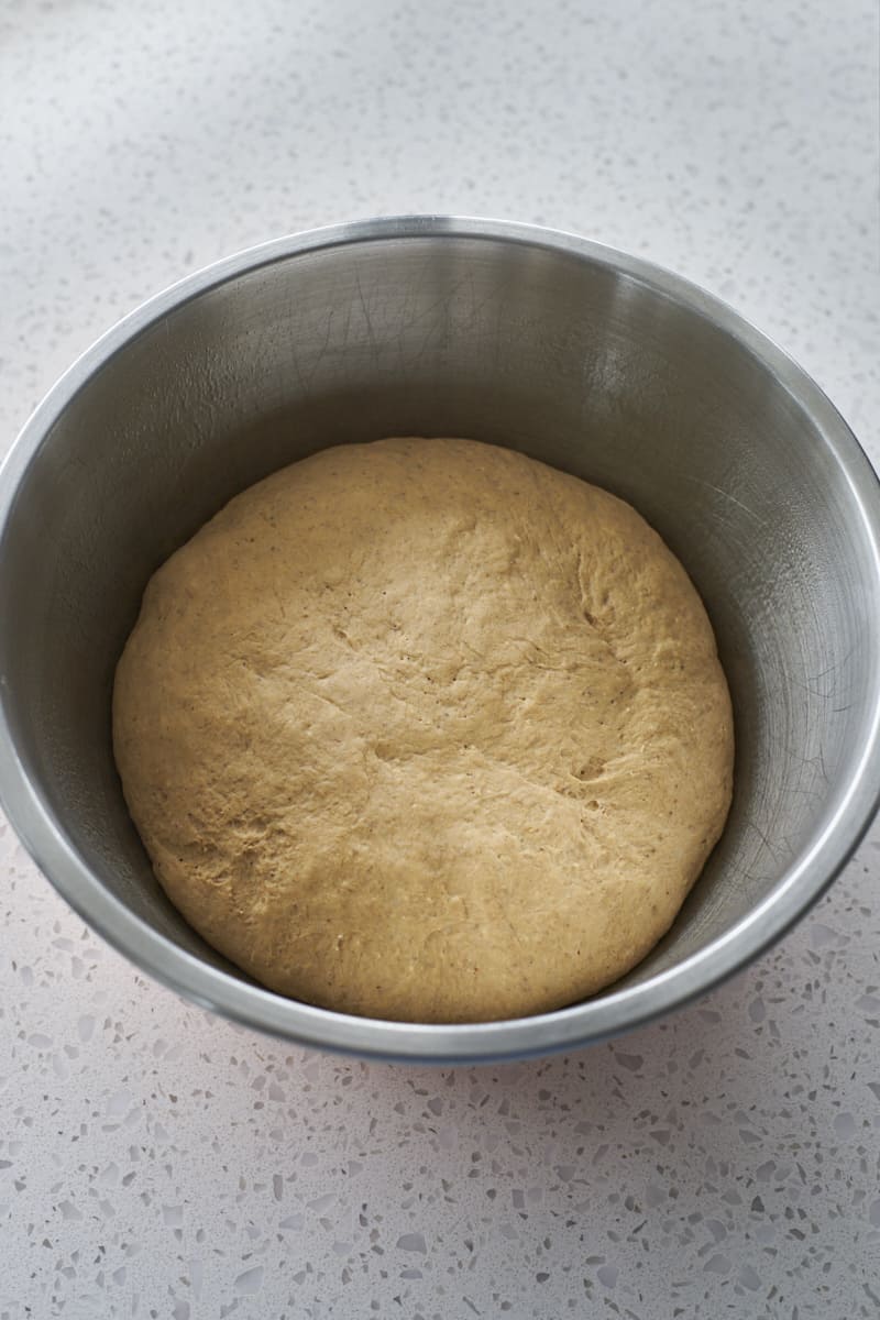 Dough in a large bowl after rising.