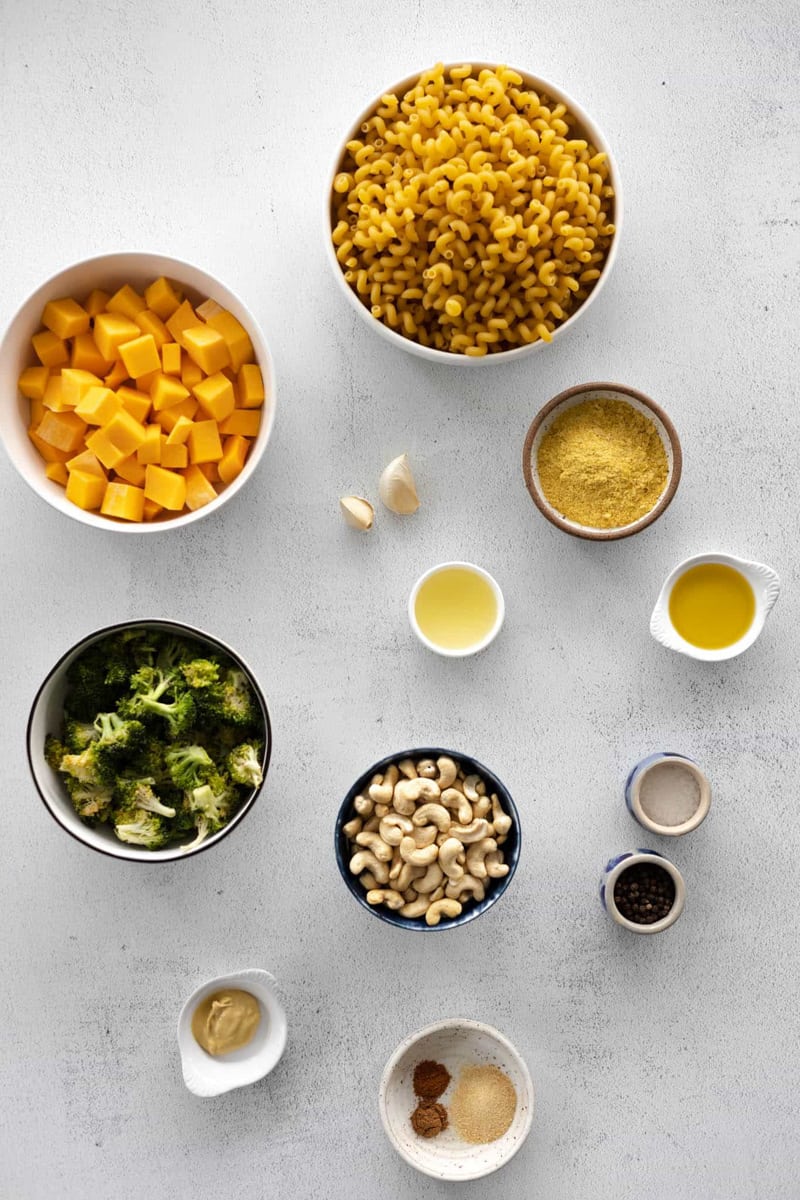 Ingredients for Vegan Butternut Squash Mac and Cheese in small bowls.