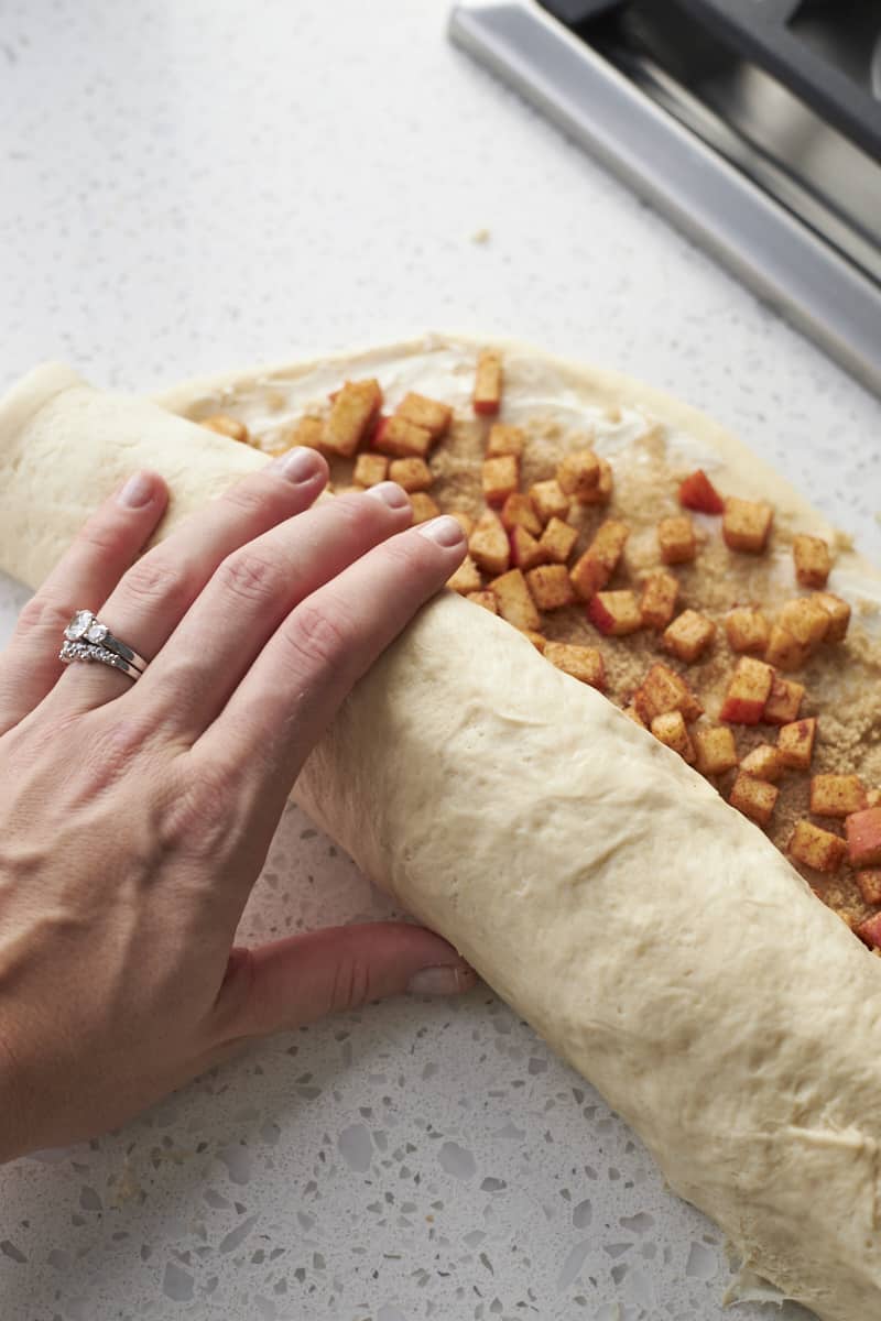 Rolling the dough into a log.