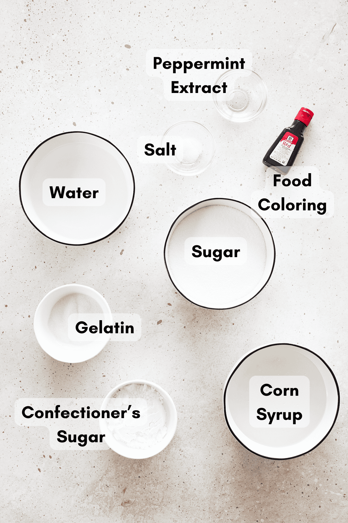 Ingredients for Candy Cane Marshmallows in small bowls. 