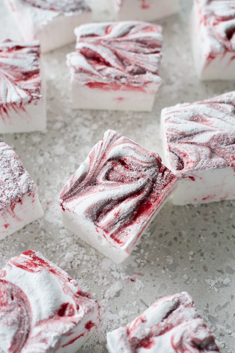 Candy Cane Marshmallows after being rolled in powdered sugar.