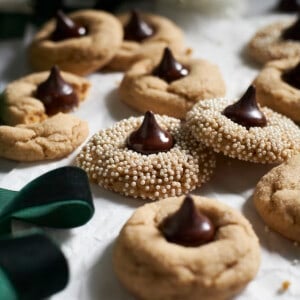 A pile of Sourdough Discard Peanut Butter Blossoms.