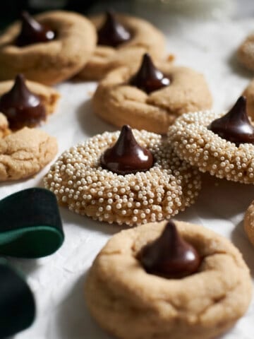 A pile of Sourdough Discard Peanut Butter Blossoms.