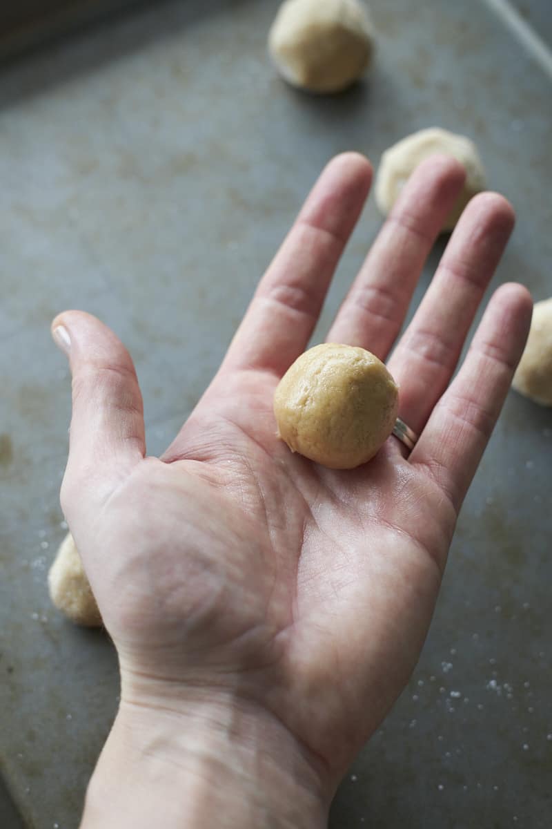A dough ball in a palm.