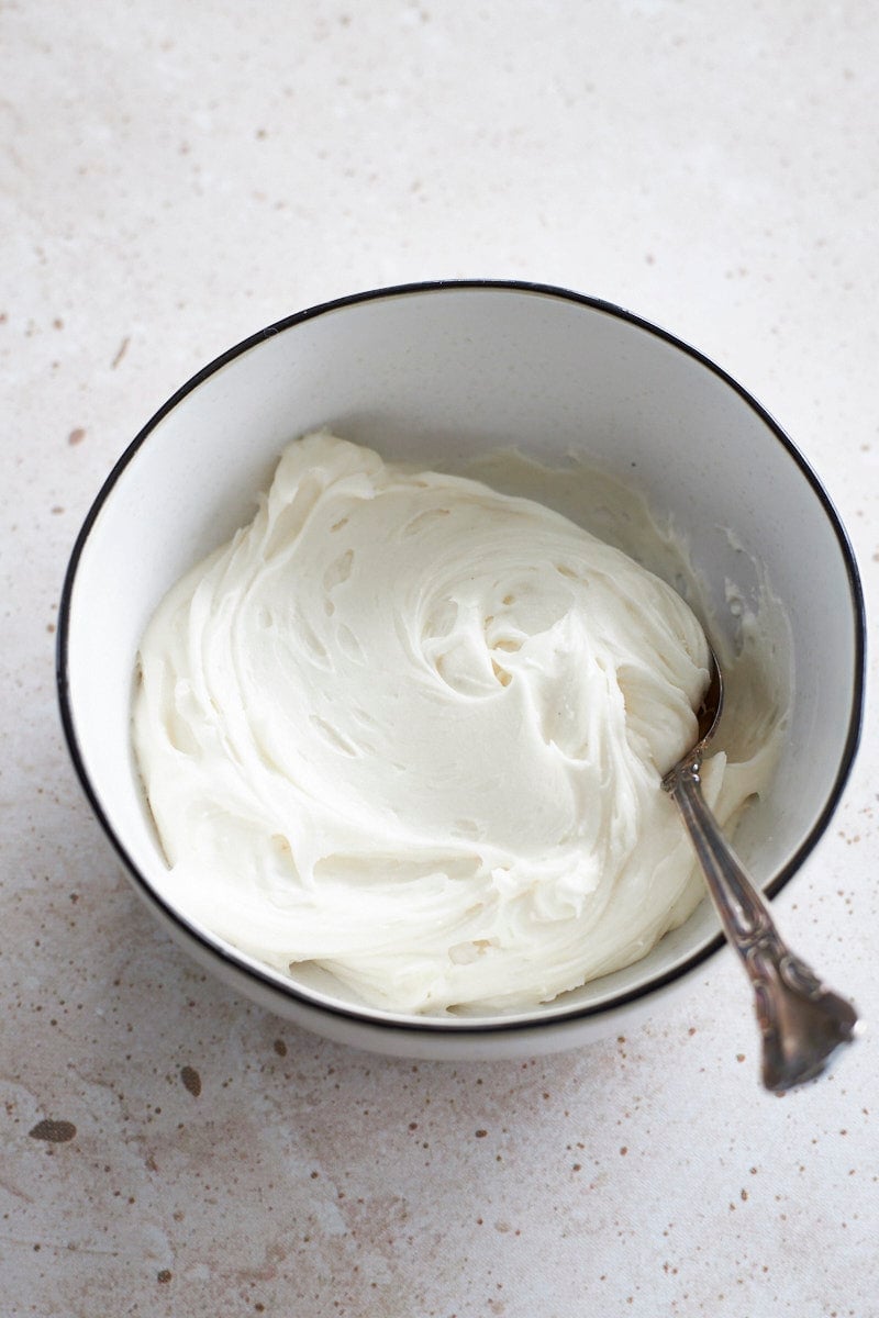 A white bowl of icing.