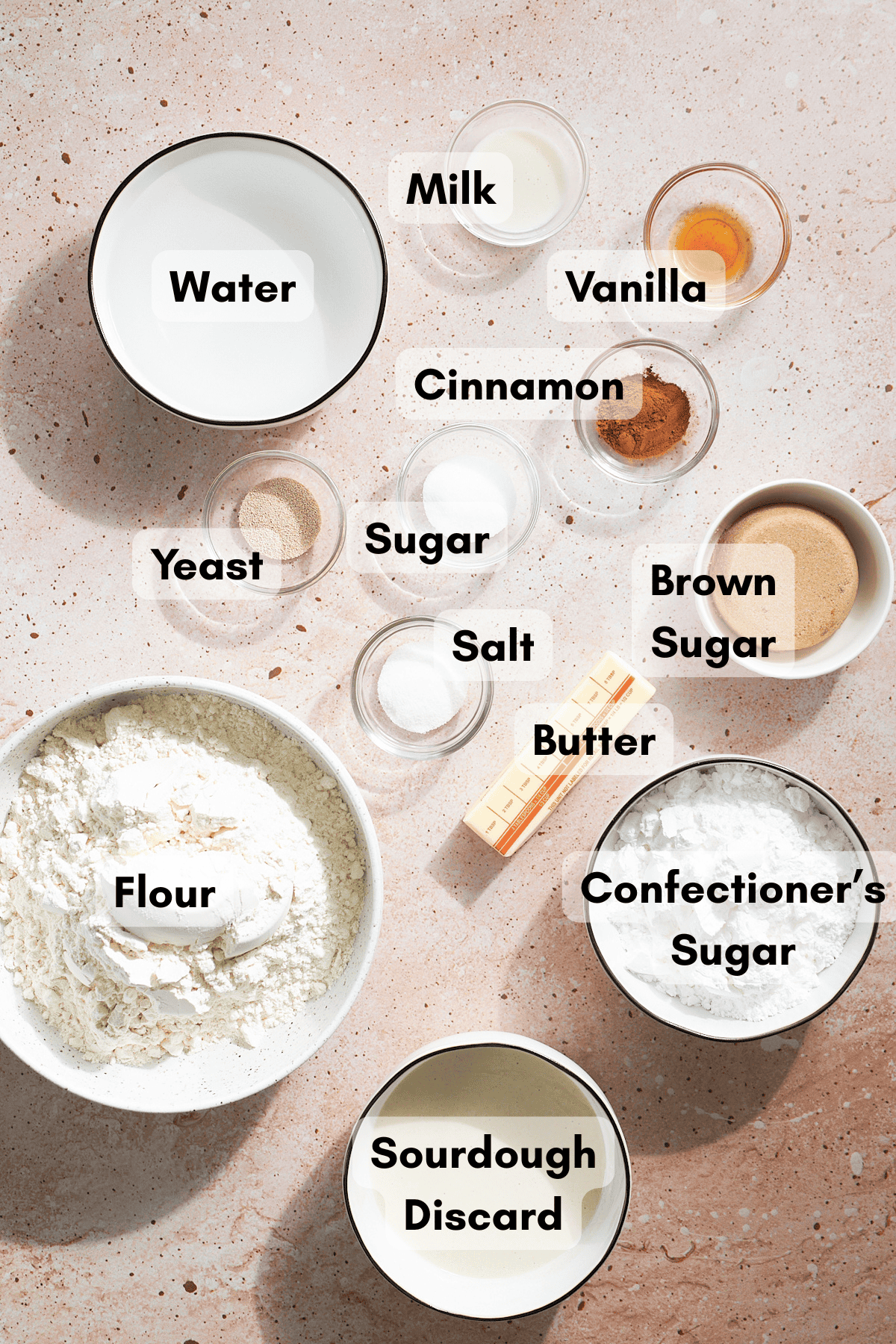 Ingredients for Sourdough Discard Cinnamon Roll Focaccia in small bowls. 