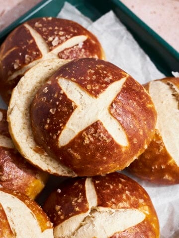 A stack of Sourdough Discard Pretzel Buns.