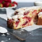 A side view of a slice of Sourdough Discard Strawberry Cake.