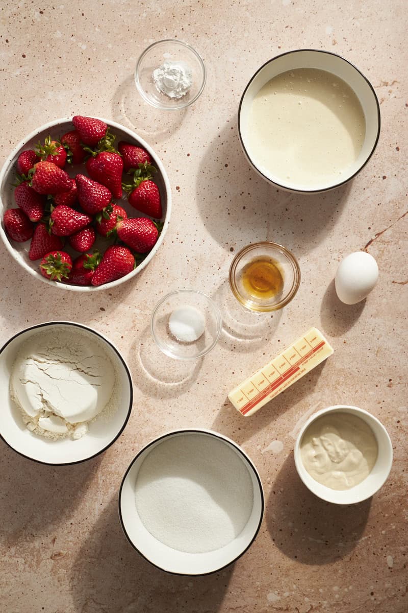 Ingredients for Sourdough Discard Strawberry Cake in small bowls.