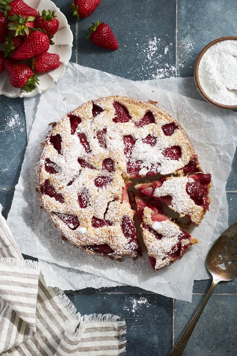 Sourdough Discard Strawberry Cake dusted with powdered sugar.