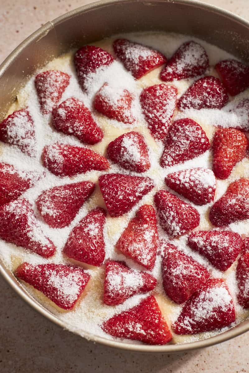 A closeup of sugar on top of the berries.