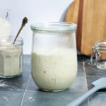 Sourdough starter in a glass jar.