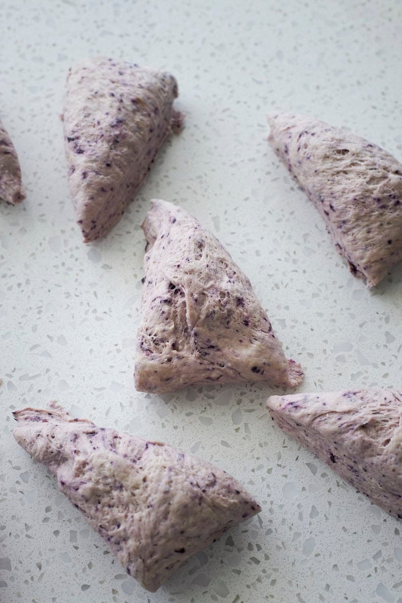 Dough divided into 8 equal-sized pieces.