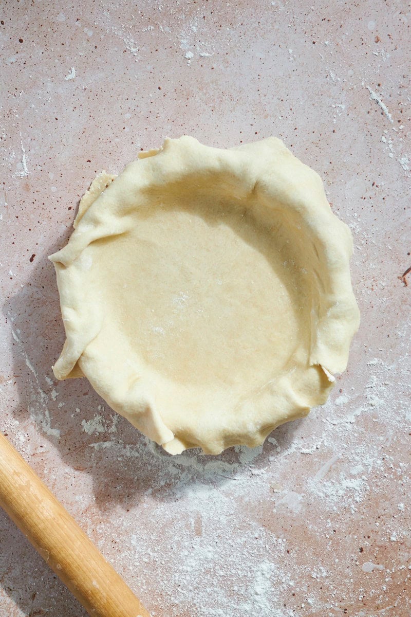 Crust laid into the pie pan.