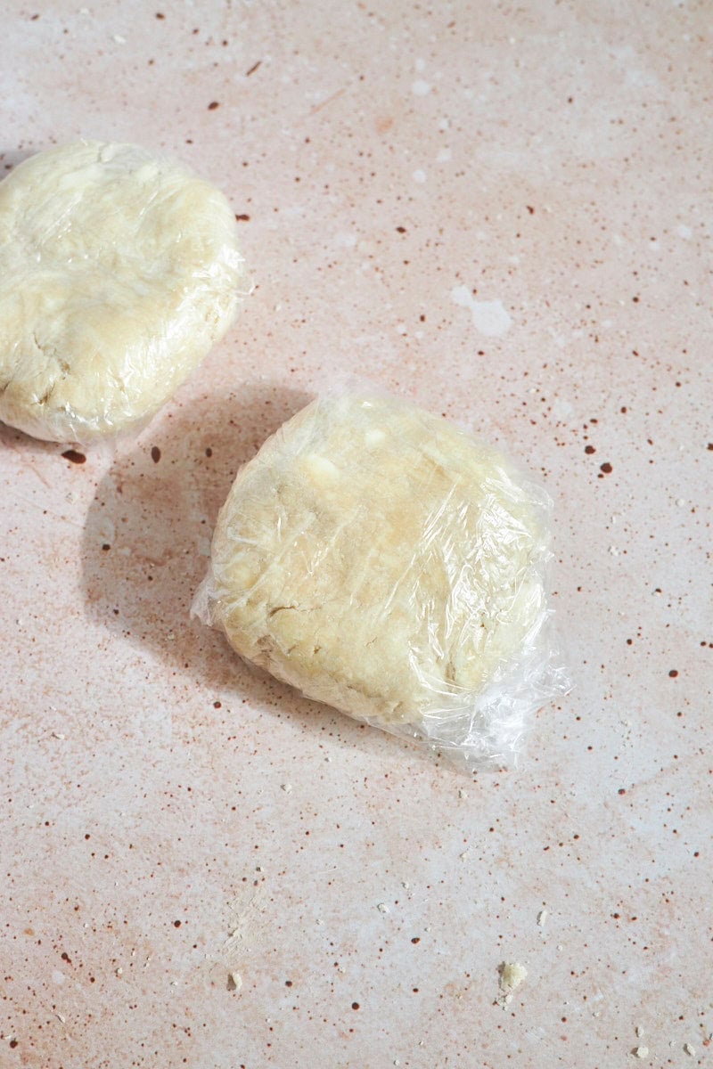 Dough wrapped in plastic wrap.