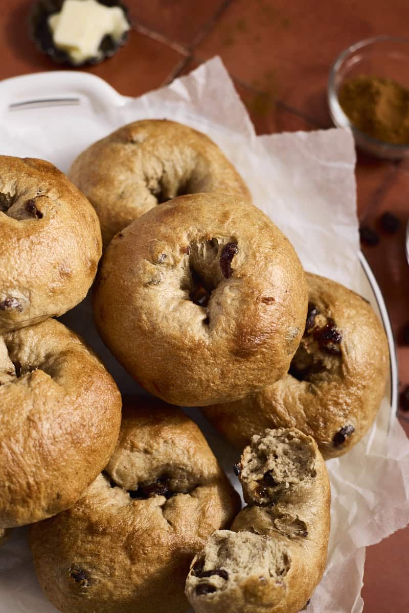 Sourdough Discard Cinnamon Raisin Bagels in a pile.