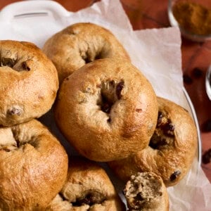 Sourdough Discard Cinnamon Raisin Bagels in a pile.