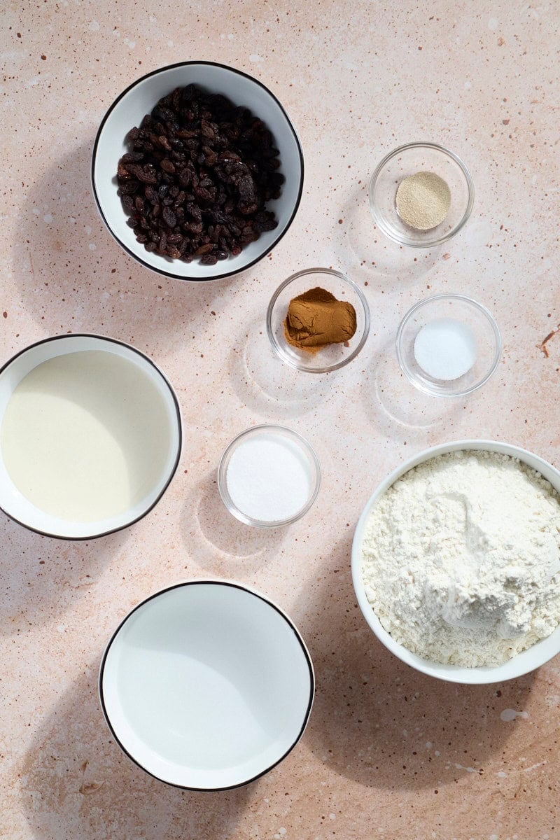 Ingredients for Sourdough Discard Cinnamon Raisin Bagels in small bowls.