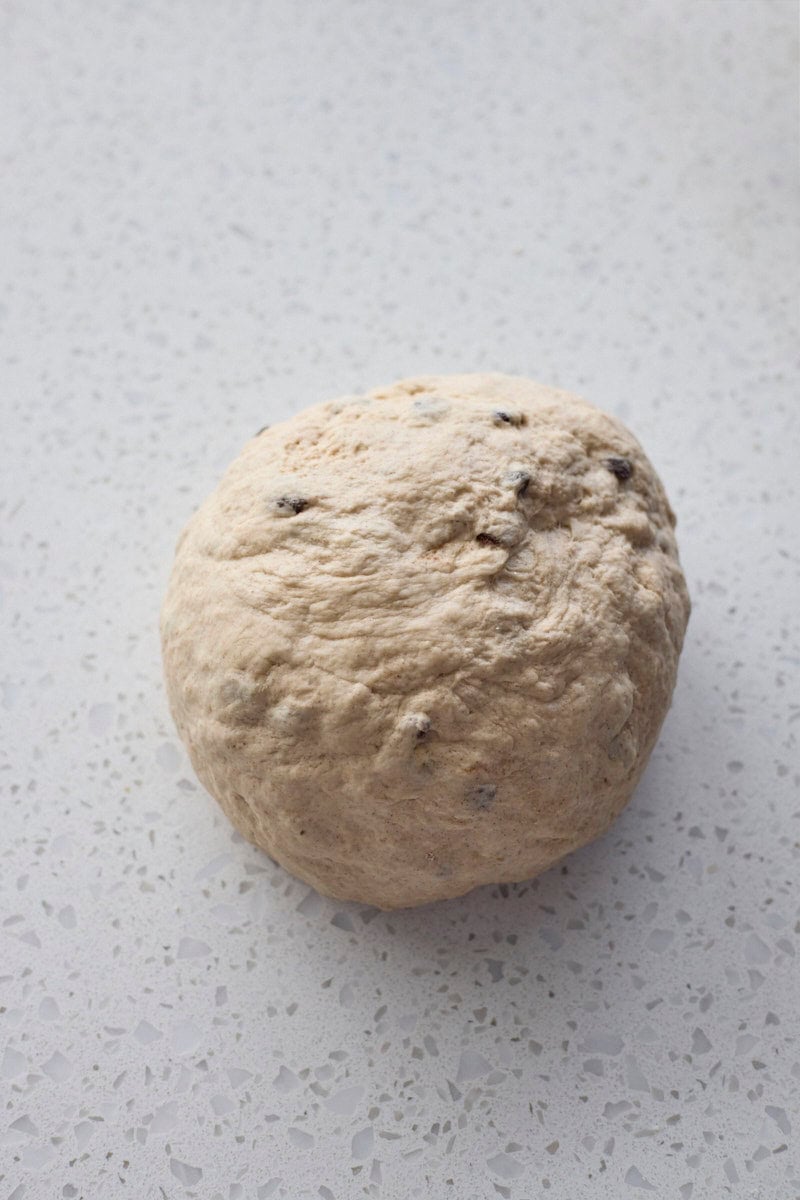 Dough kneaded into a smooth ball.