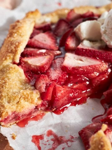 A side view of a slice of the Sourdough Discard Strawberry Galette.
