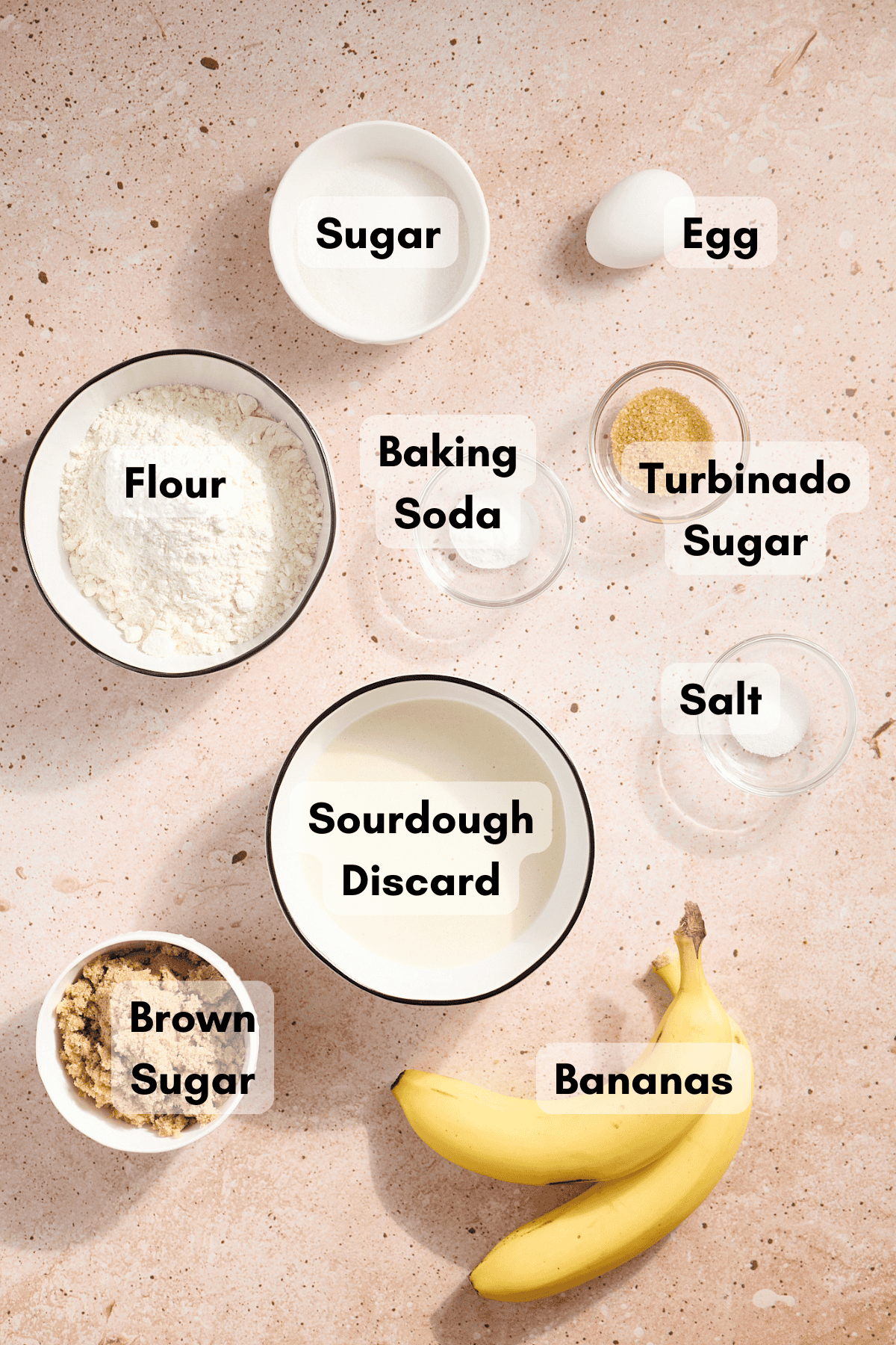 Ingredients for Sourdough Discard Banana Bread in small bowls. 