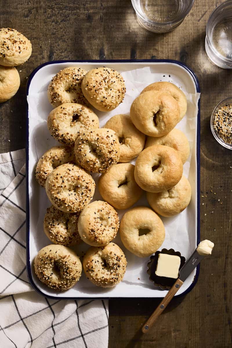 Mini Sourdough Discard Bagels on a white tray.