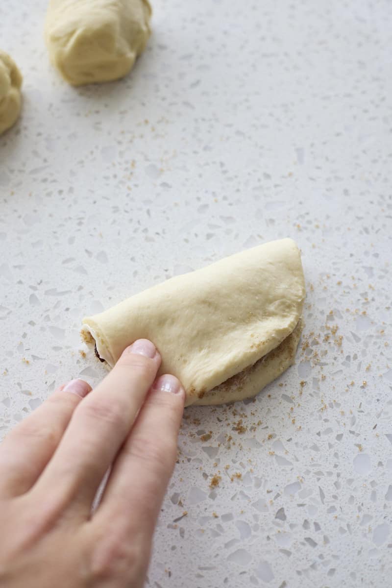 Dough piece folded in half.
