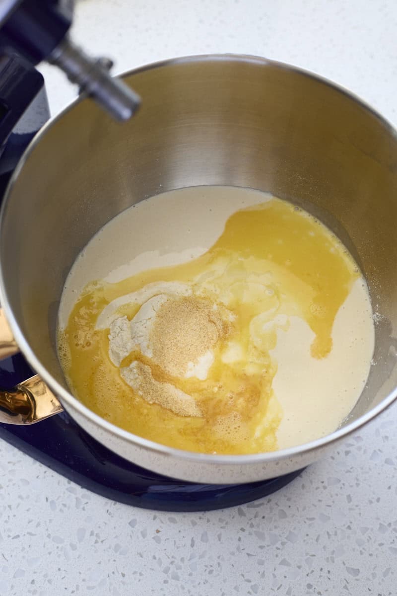 Ingredients in the bowl of a stand mixer.