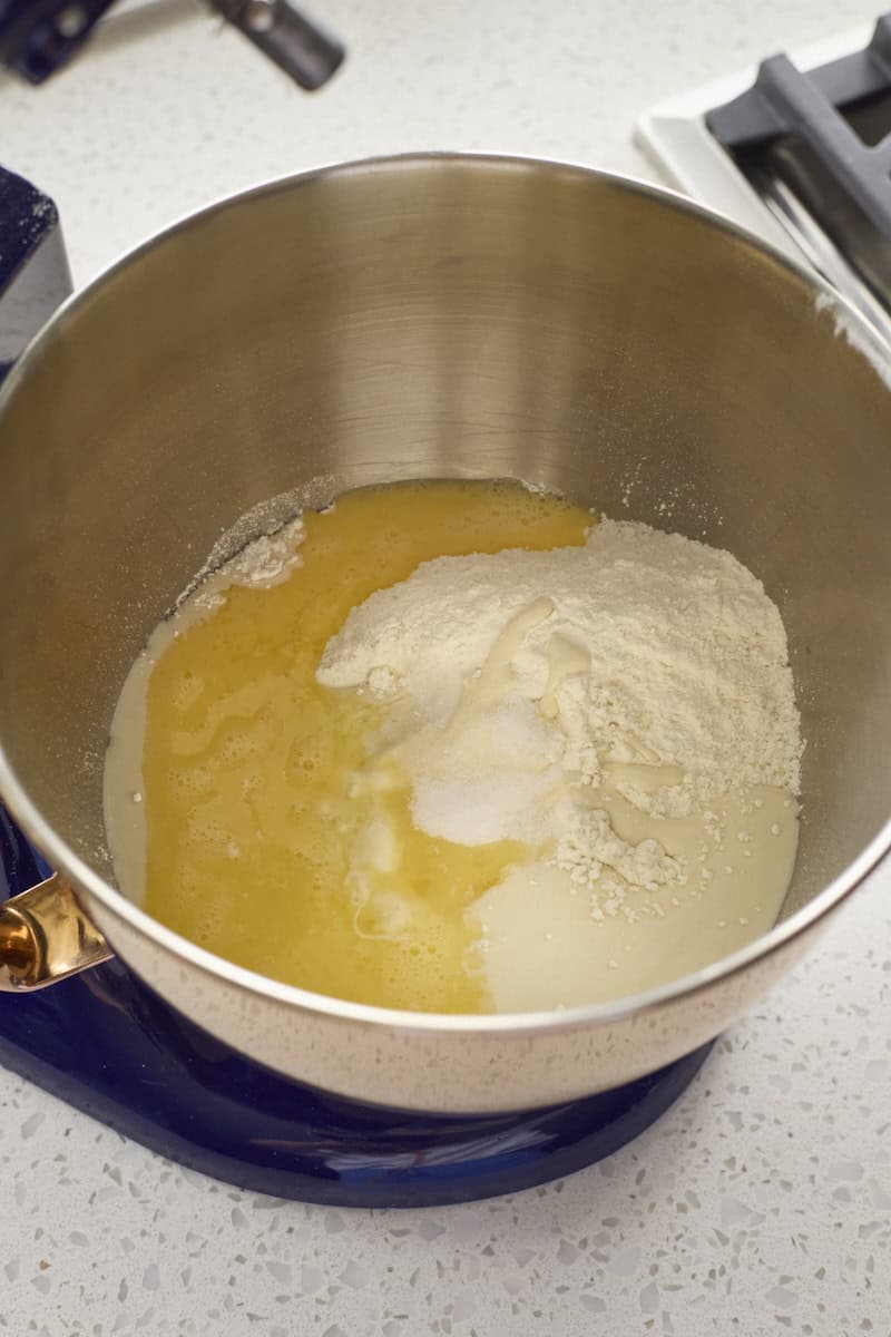 Ingredients in the bowl of a stand mixer.