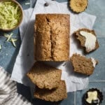 Sliced Sourdough Discard Zucchini Bread on parchment paper.