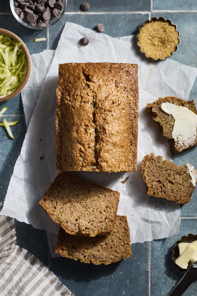 Sliced Sourdough Discard Zucchini Bread on parchment paper.