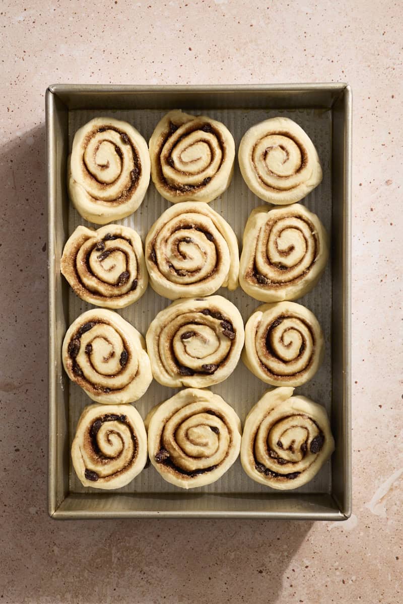 Sourdough Discard Cinnamon Rolls placed in a baking pan.