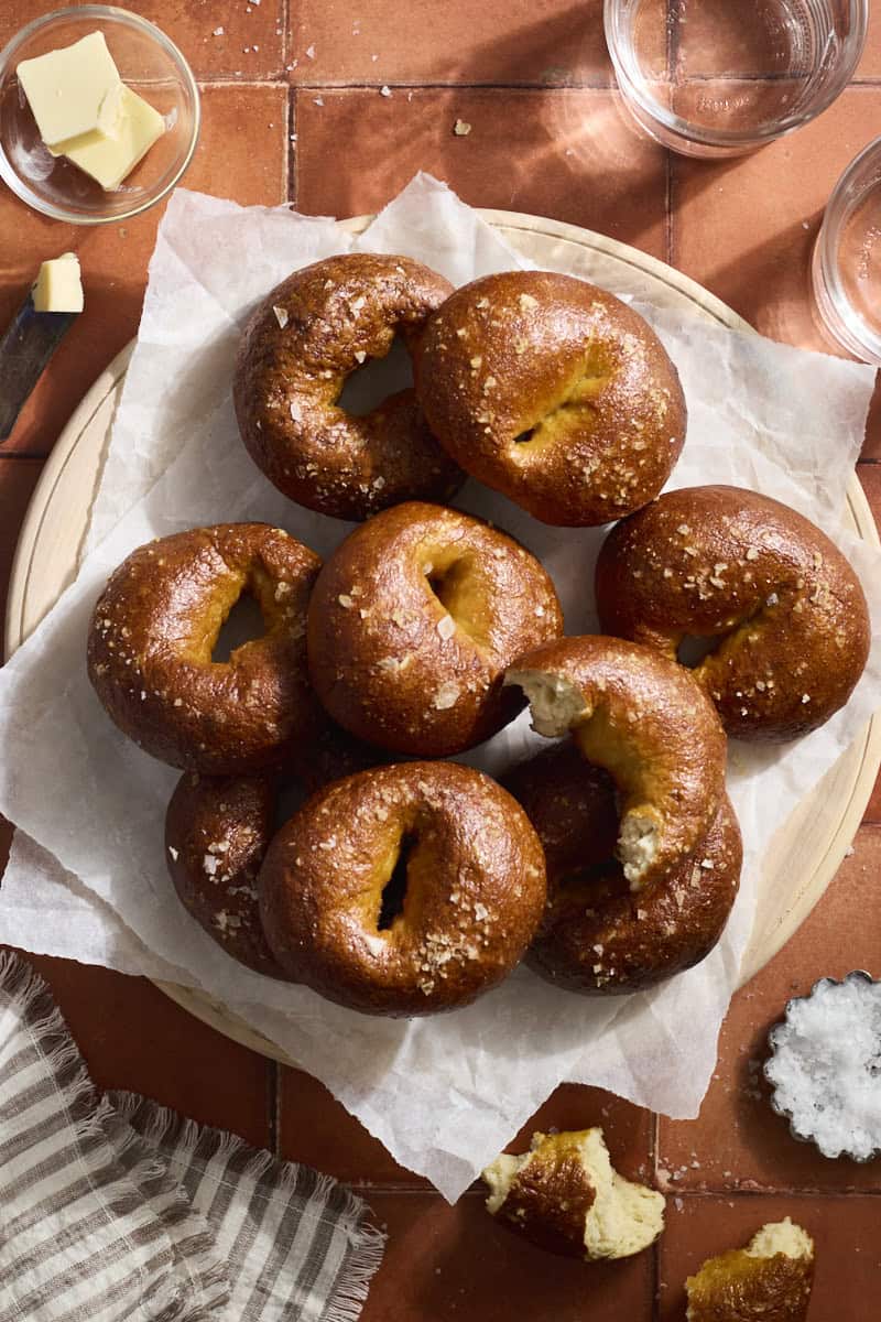 Sourdough Discard Pretzel Bagels in a pile on a platter.