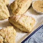 Sourdough Discard Scones drizzled with glaze.