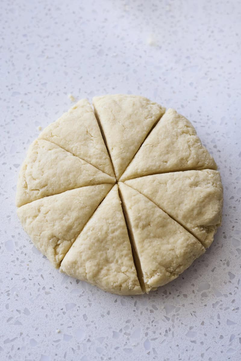 Dough cut into 8 triangles.