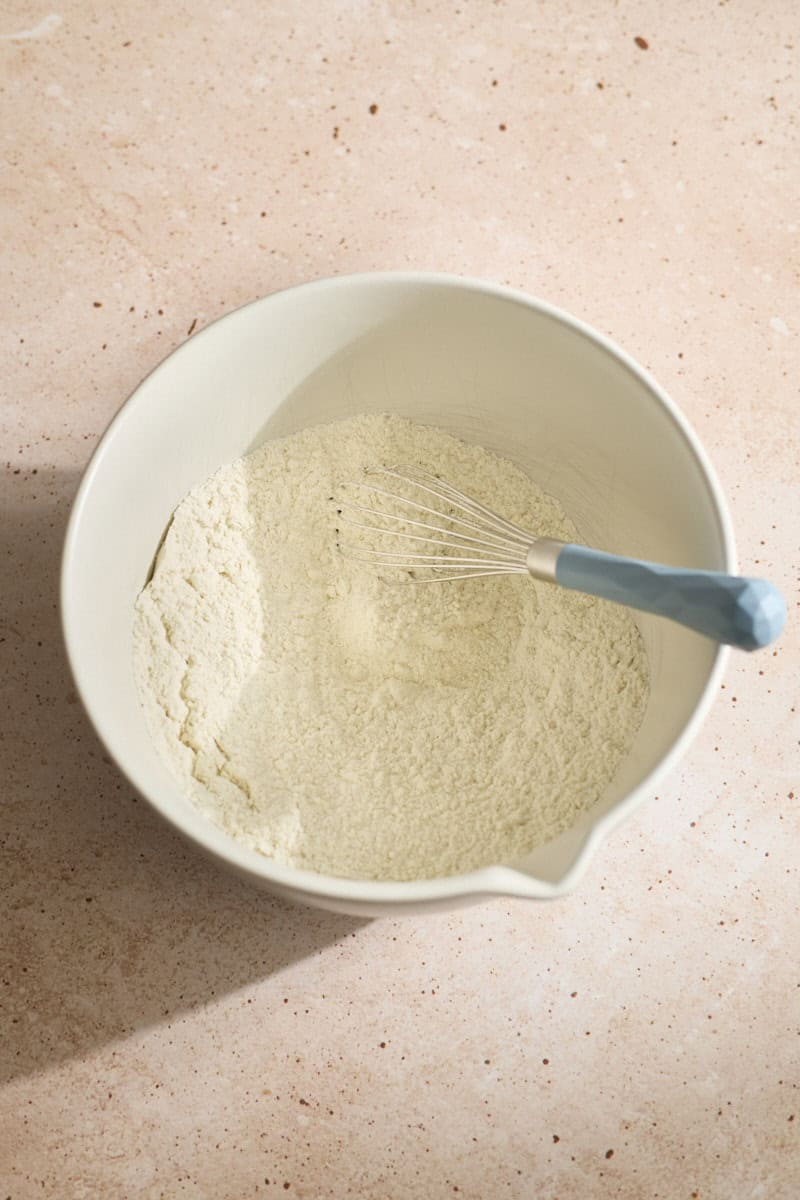 Dry ingredients mixed in a white bowl.